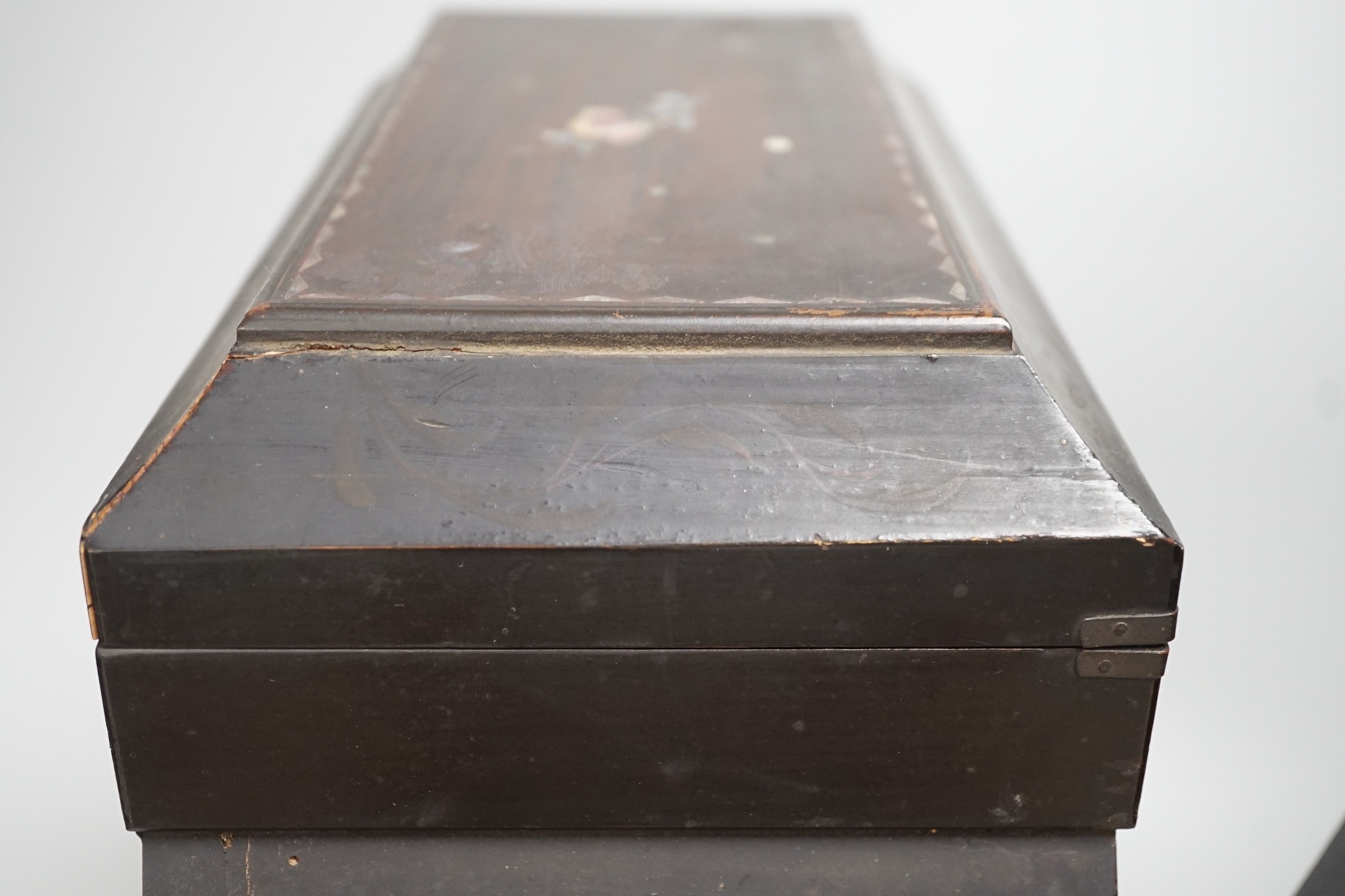 A Japanese inlaid mother-of-pearl miniature chest. 36cm tall